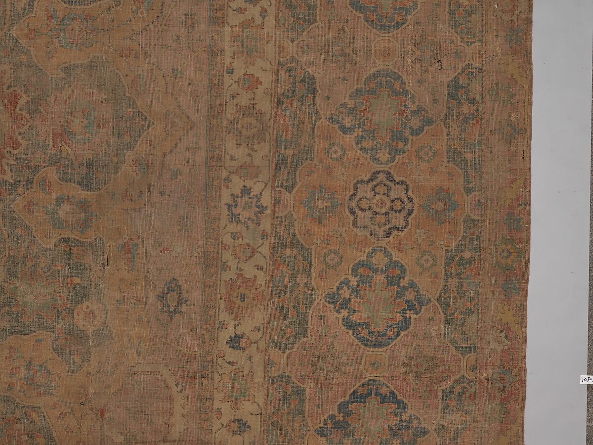 Carpet, Cotton (warp and weft), wool (pile); asymmetrically knotted pile 
