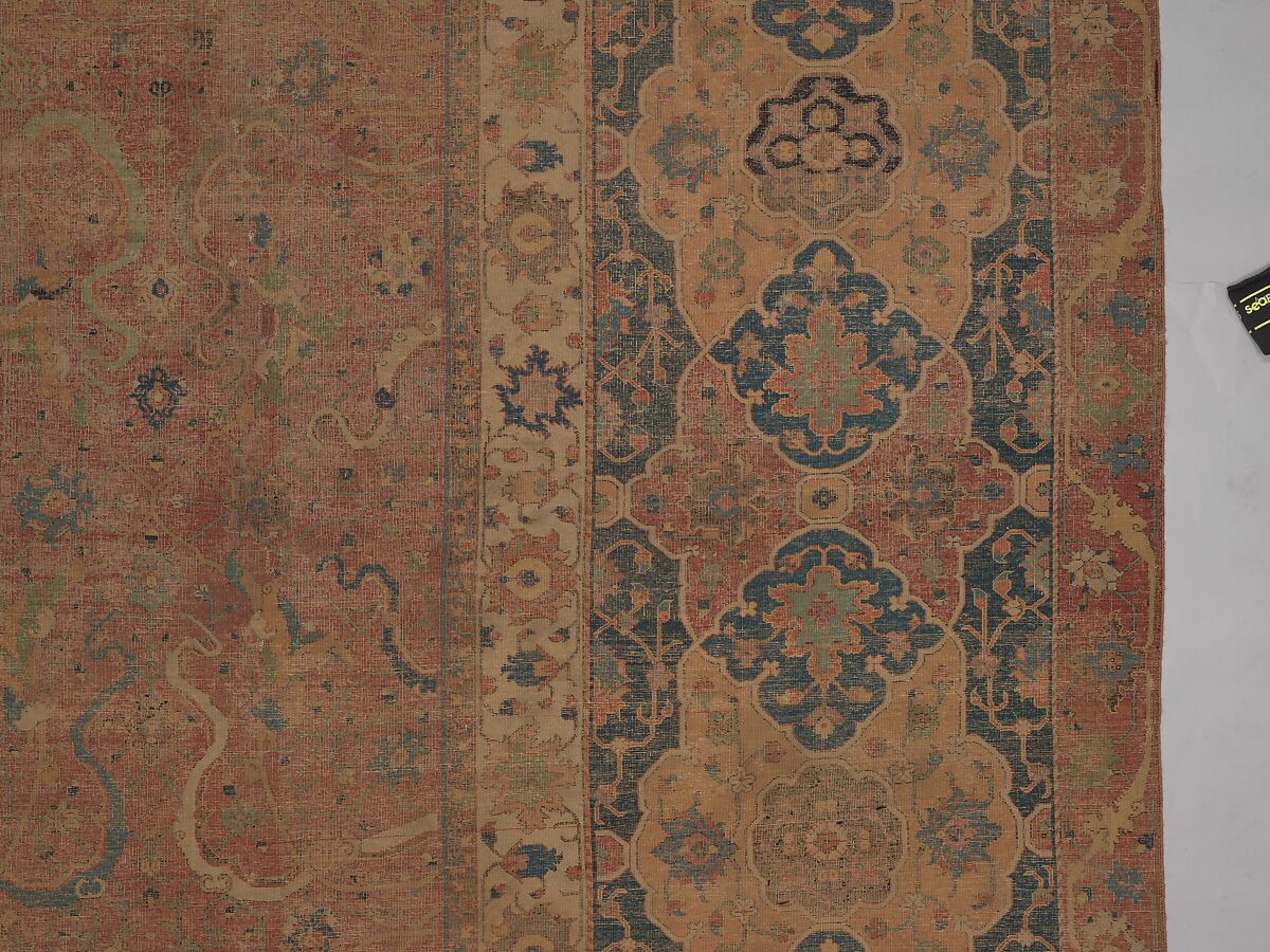 Carpet, Cotton (warp and weft), wool (pile); asymmetrically knotted pile 
