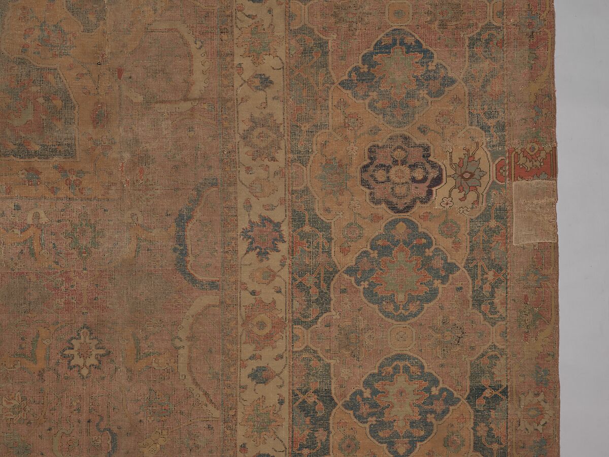 Carpet, Cotton (warp and weft), wool (pile); asymmetrically knotted pile 