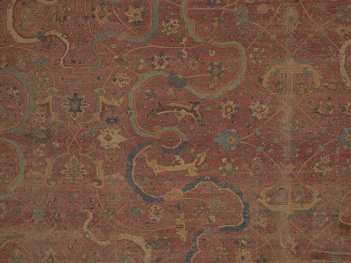 Carpet, Cotton (warp and weft), wool (pile); asymmetrically knotted pile 