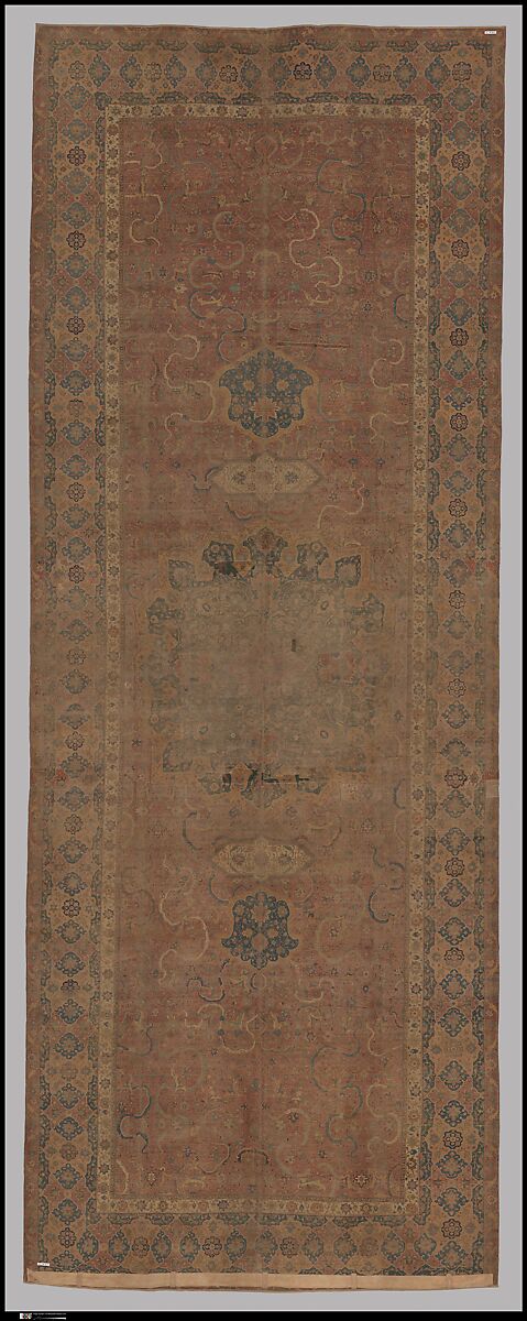 Carpet, Cotton (warp and weft), wool (pile); asymmetrically knotted pile 