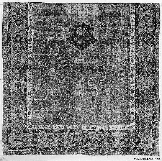 Carpet, Cotton (warp and weft), wool (pile); asymmetrically knotted pile 