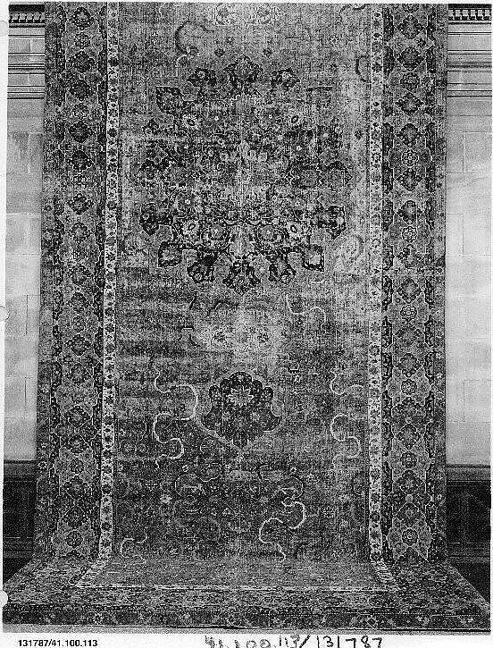 Carpet, Cotton (warp and weft), wool (pile); asymmetrically knotted pile 