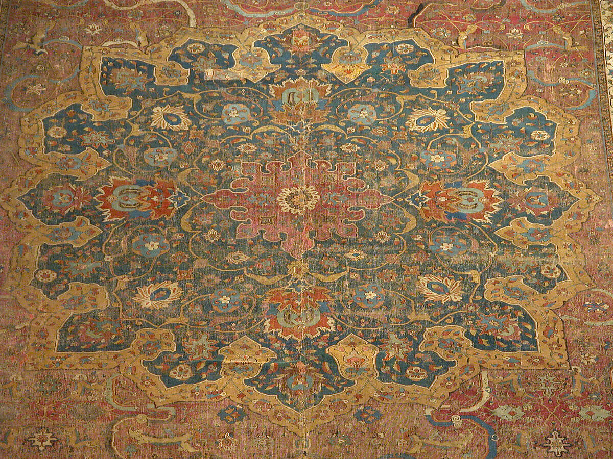 Carpet, Cotton (warp and weft), wool (pile); asymmetrically knotted pile 