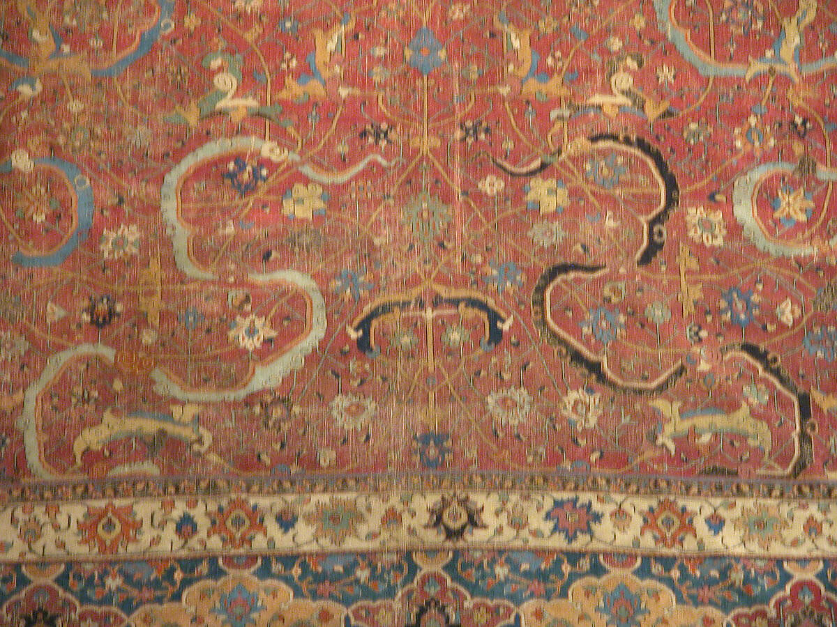 Carpet, Cotton (warp and weft), wool (pile); asymmetrically knotted pile 