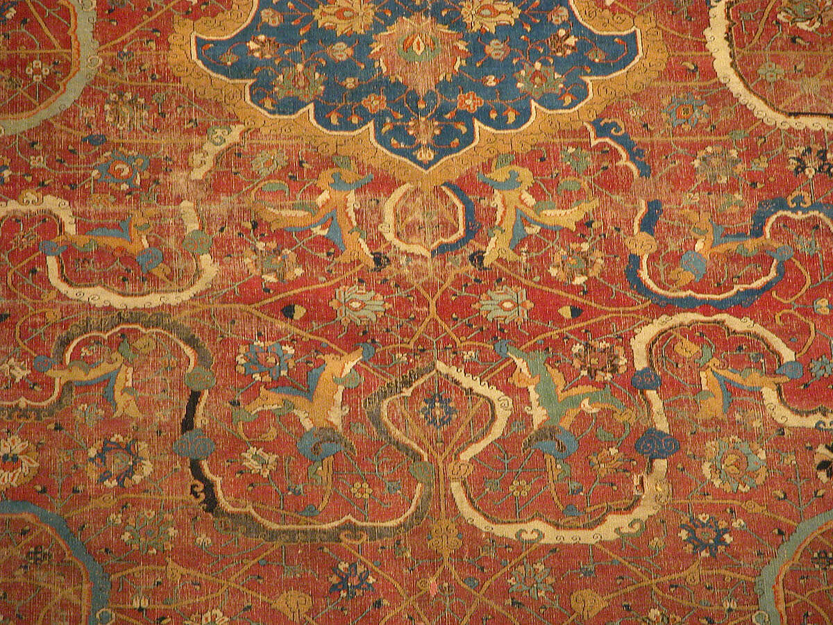 Carpet, Cotton (warp and weft), wool (pile); asymmetrically knotted pile 
