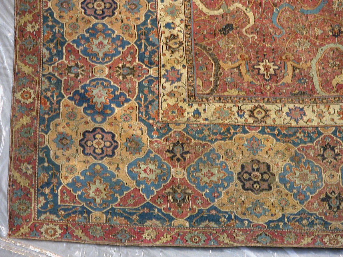 Carpet, Cotton (warp and weft), wool (pile); asymmetrically knotted pile 