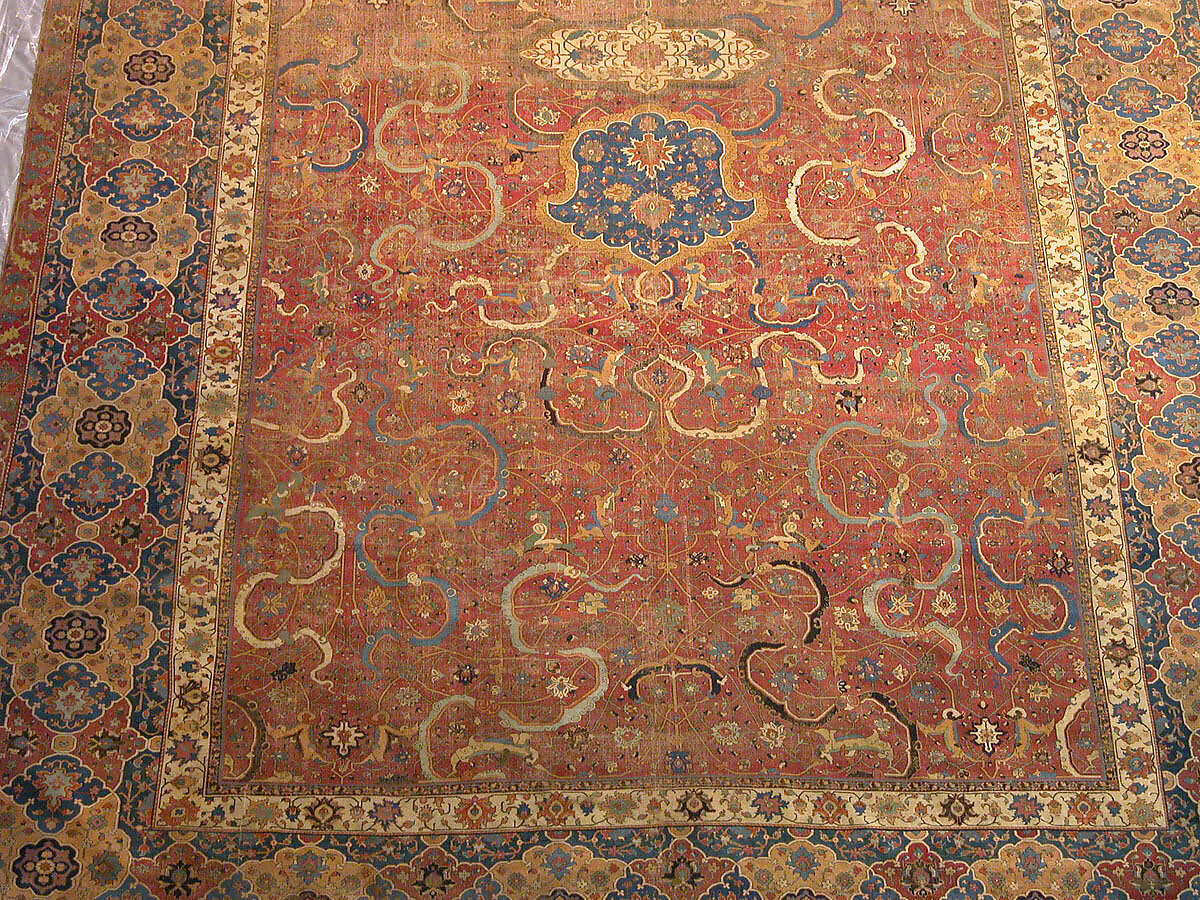 Carpet, Cotton (warp and weft), wool (pile); asymmetrically knotted pile 