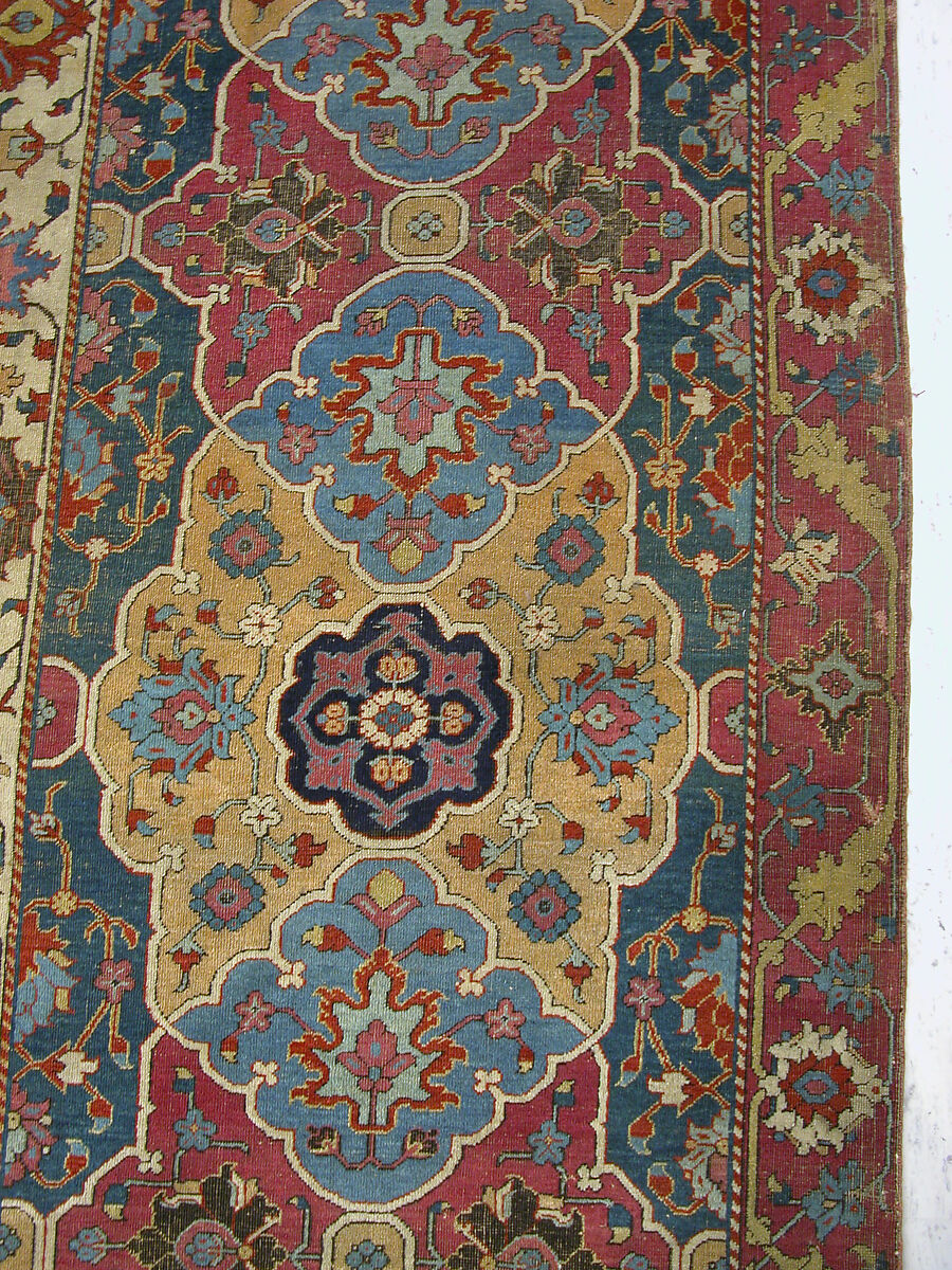 Carpet, Cotton (warp and weft), wool (pile); asymmetrically knotted pile 