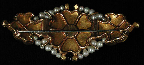 Centerpiece of an Armband, Cartier (French, founded Paris, 1847), Gold, inset with rubies, emeralds, and colorless sapphires; with later pearls, diamonds, onyx