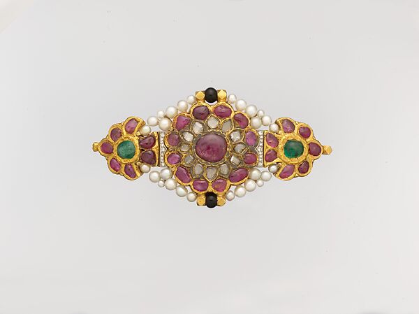 Centerpiece of an Armband, Cartier (French, founded Paris, 1847), Gold, inset with rubies, emeralds, and colorless sapphires; with later pearls, diamonds, onyx 