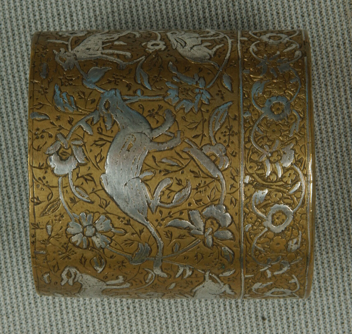 Inkwell with Floral and Animal Imagery, Brass; lid cast, body worked, engraved, and chased, inlaid with silver
