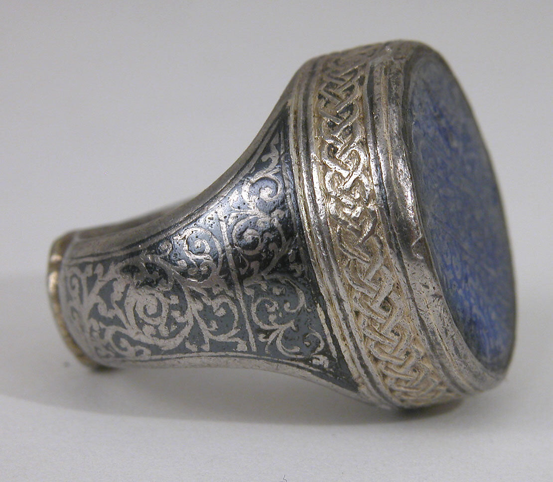 Seal Ring with the Name of Hajji Muhammad ibn Mahmud, Bezel: lapis-lazuli; carvedShank: silver; worked, gilded, and with black inlay