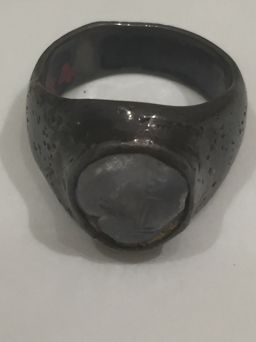 Ring, Silver; set with colorless cabochon stone