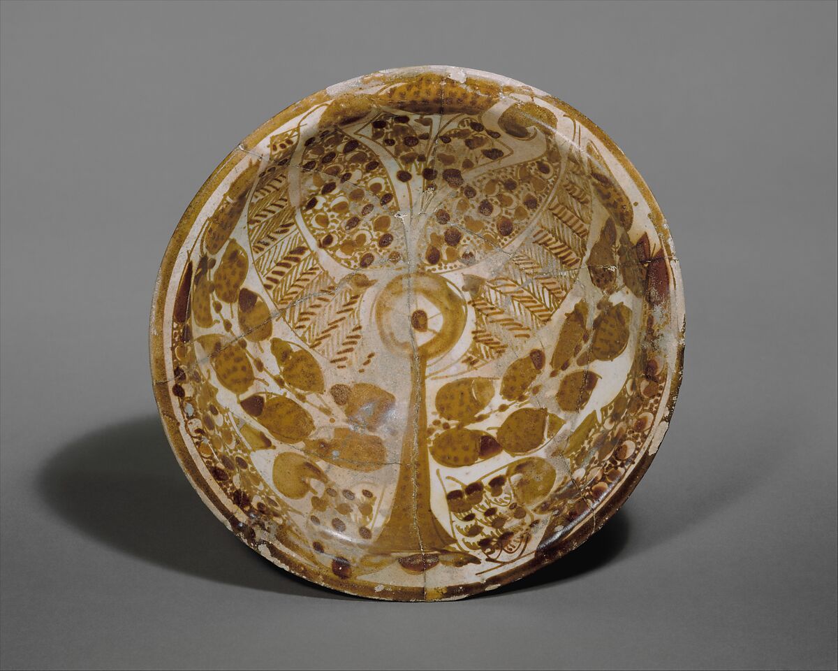 Three-color Luster Bowl with Stylized Tree, Earthenware; polychrome luster-painted on opaque white glaze 