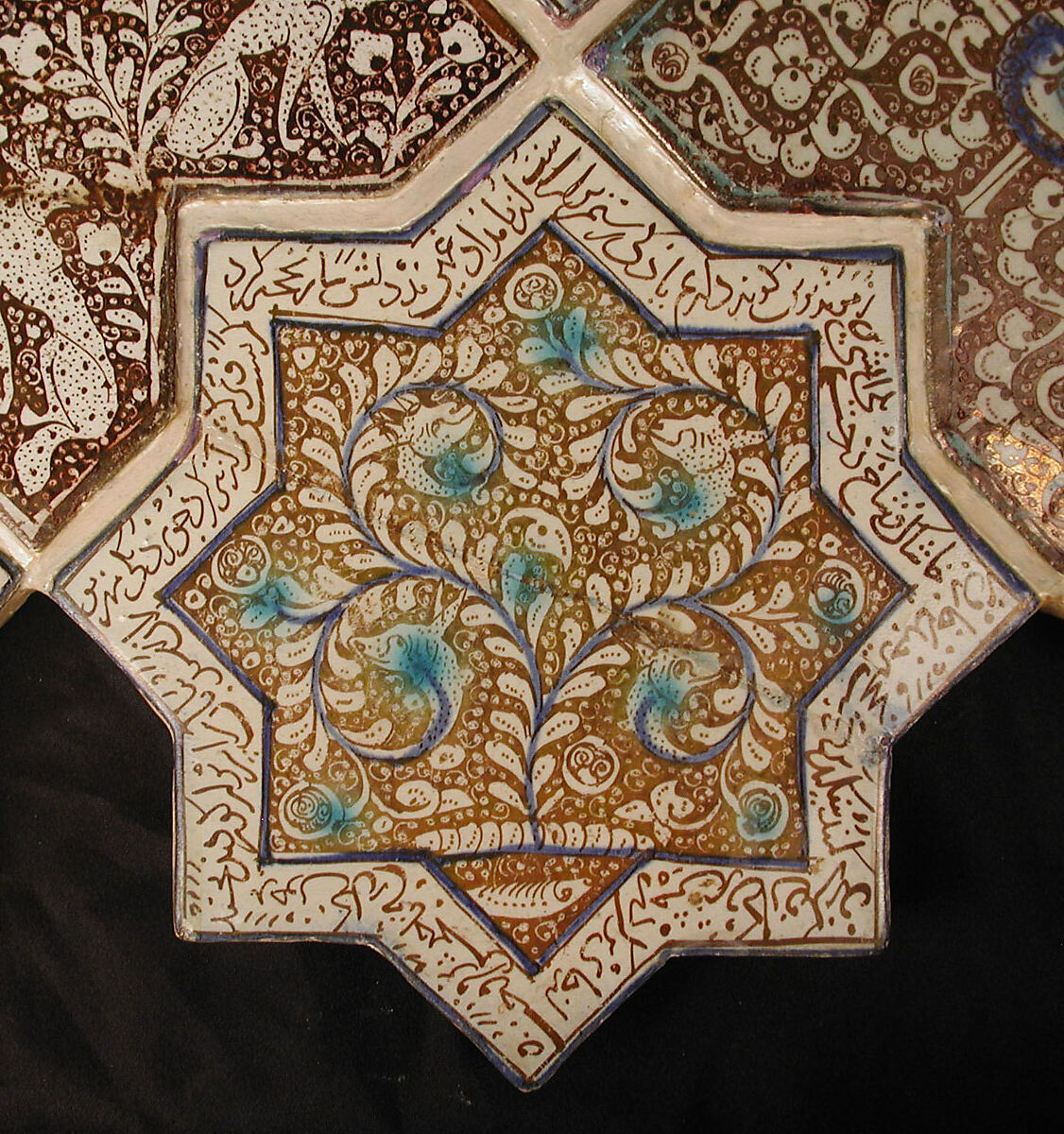 Star-Shaped Tile, Stonepaste; inglaze painted in blue and turquoise and luster-painted on opaque white glaze