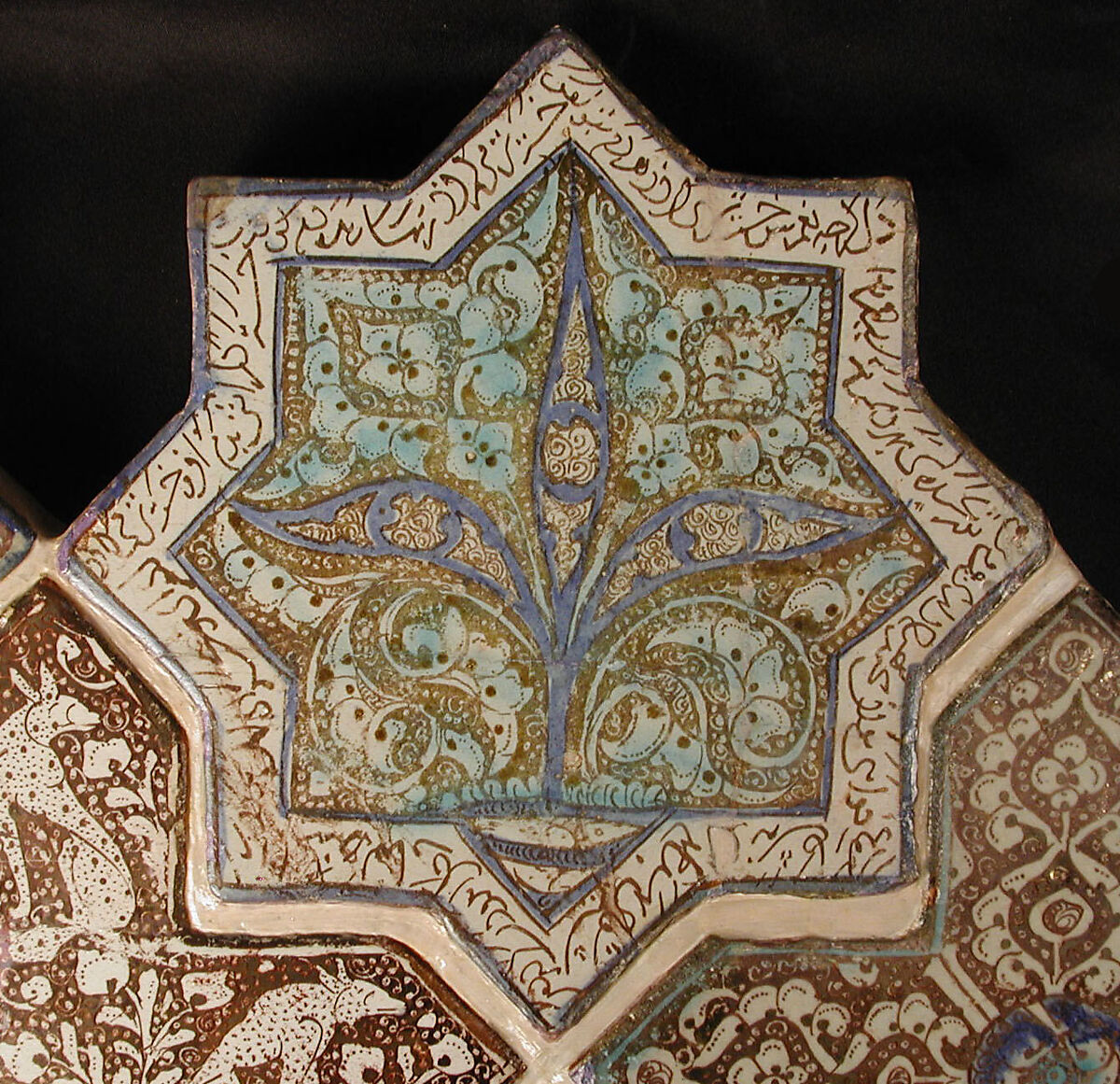 Star-Shaped Tile, Stonepaste; inglaze painted in blue and turquoise and luster-painted on opaque white glaze