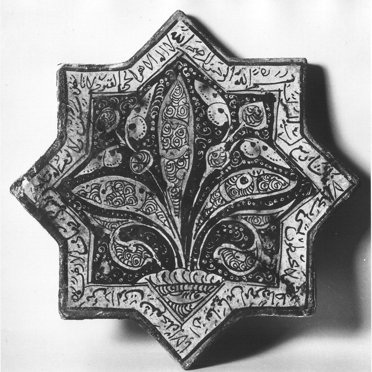 Star-Shaped Tile, Stonepaste; inglaze painted in blue and turquoise and luster-painted on opaque white glaze