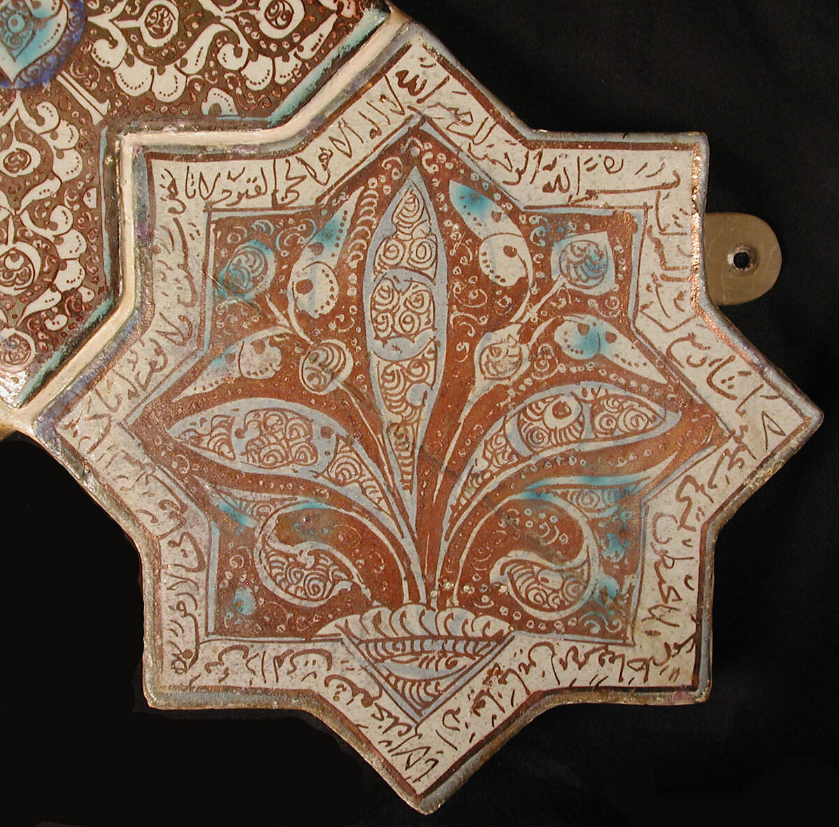 Star-Shaped Tile, Stonepaste; inglaze painted in blue and turquoise and luster-painted on opaque white glaze