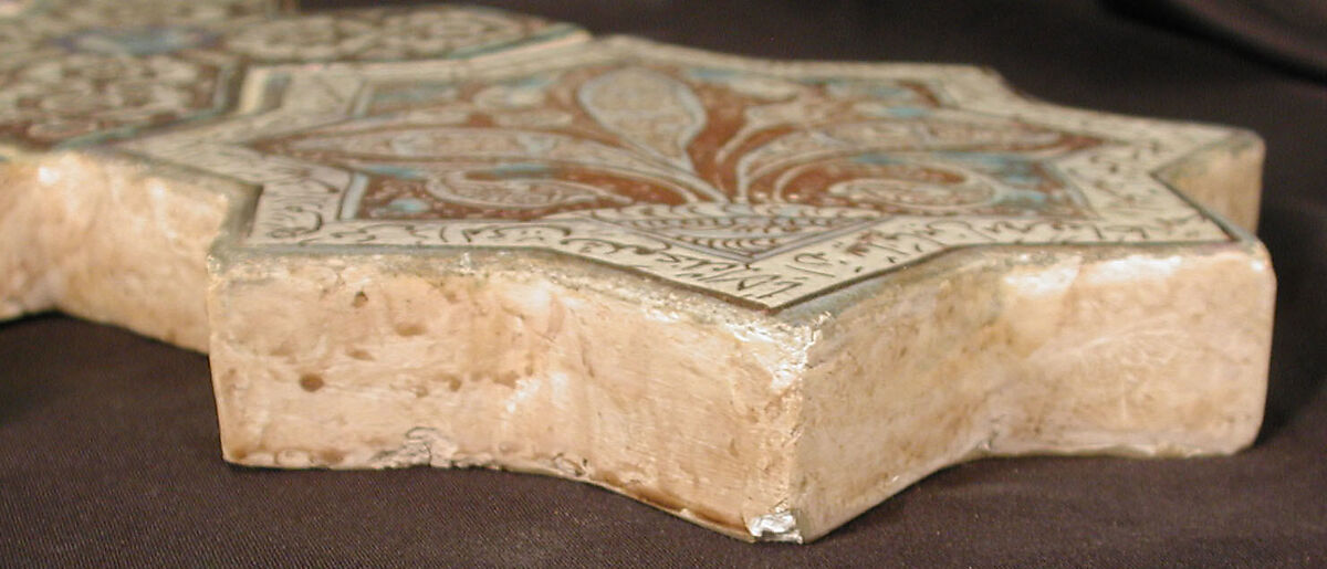 Star-Shaped Tile, Stonepaste; inglaze painted in blue and turquoise and luster-painted on opaque white glaze