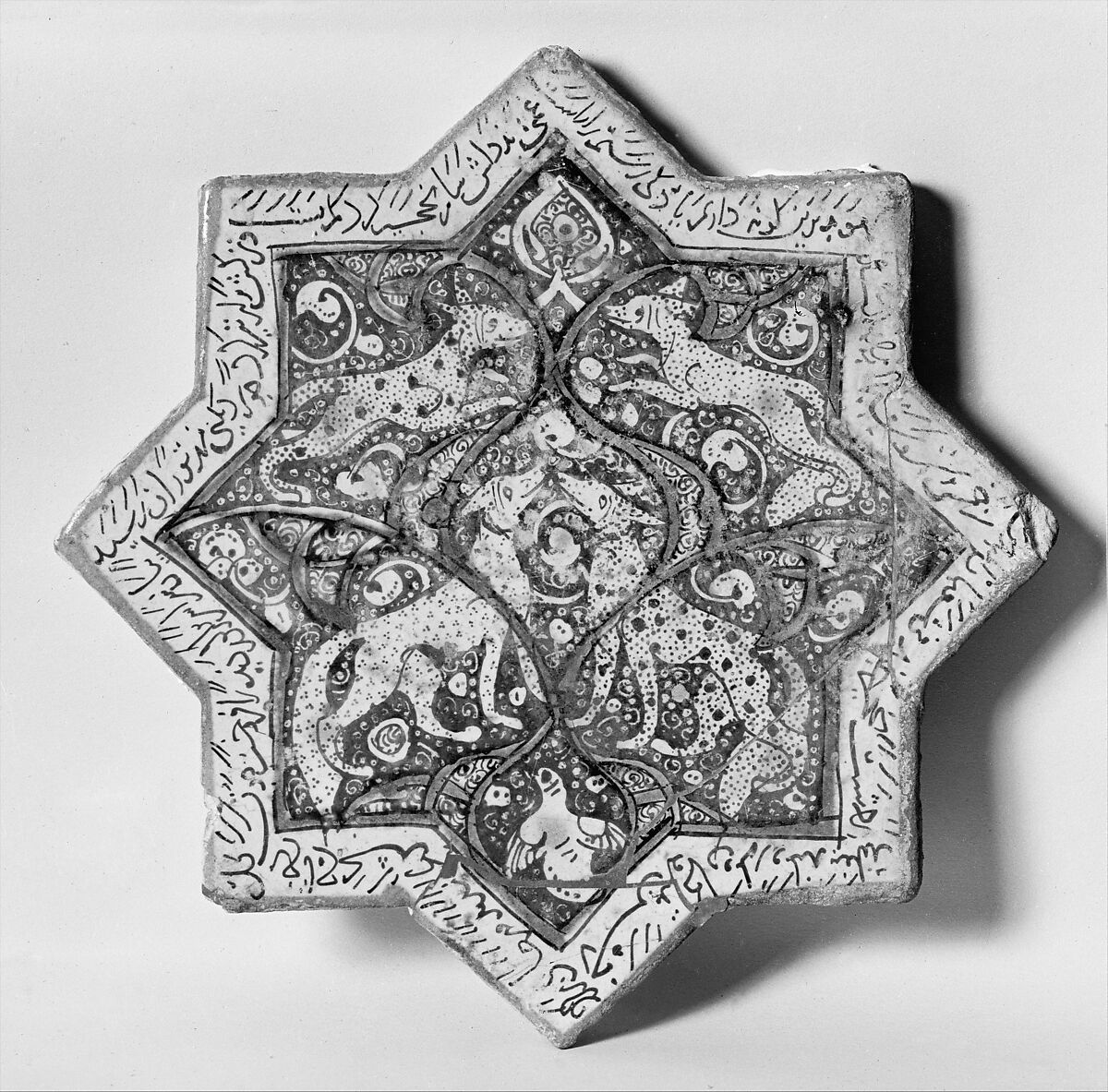 Eight-pointed Star Tile Depicting Animals and Inscription, Stonepaste; luster-painted on opaque white glaze under transparent glaze