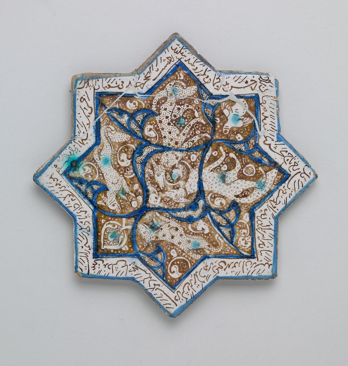 Eight-pointed Star Tile Depicting Animals and Inscription, Stonepaste; luster-painted on opaque white glaze under transparent glaze