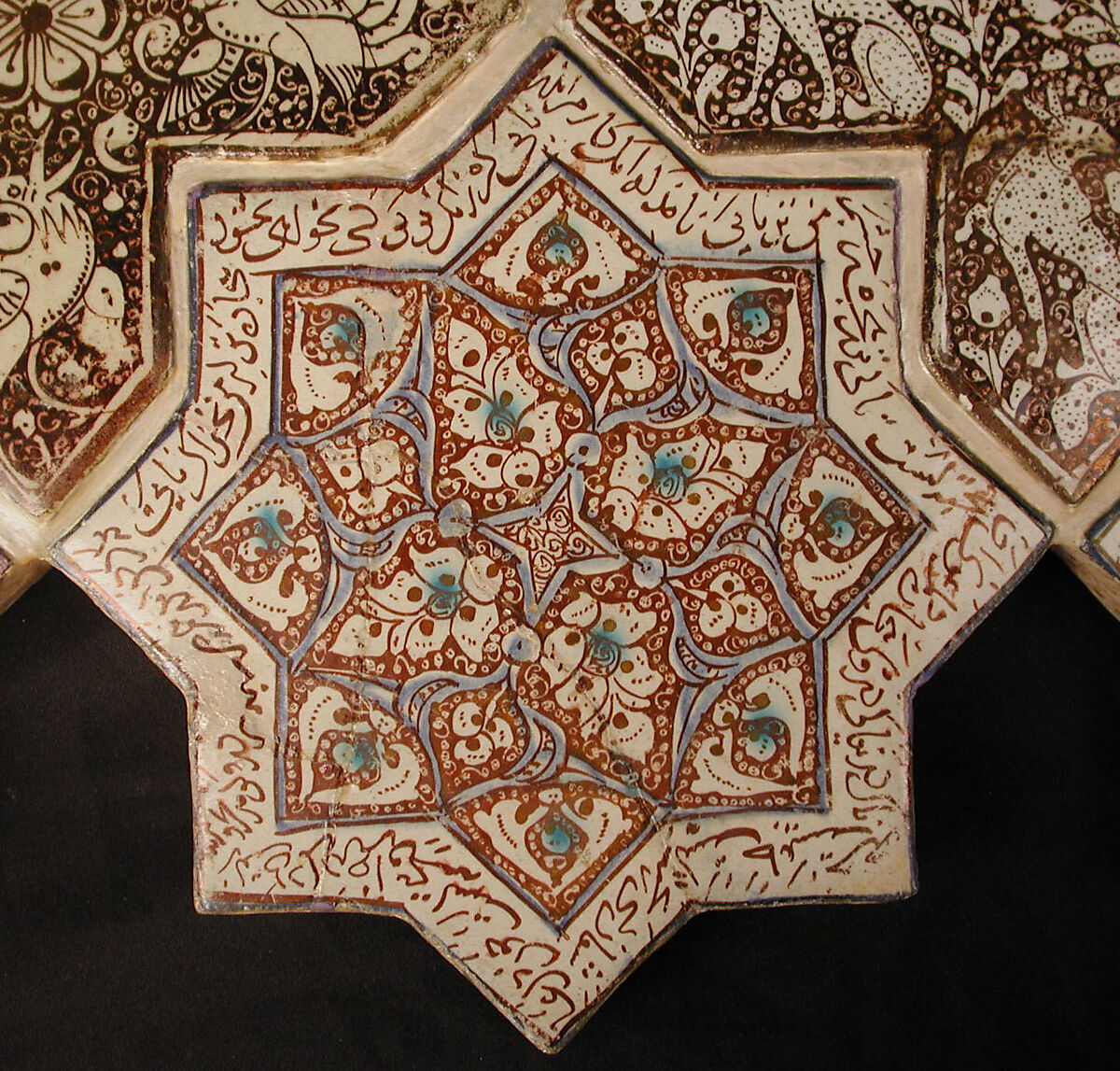 Star-Shaped Tile, Stonepaste; inglaze painted in blue and turquoise and luster-painted on opaque white glaze