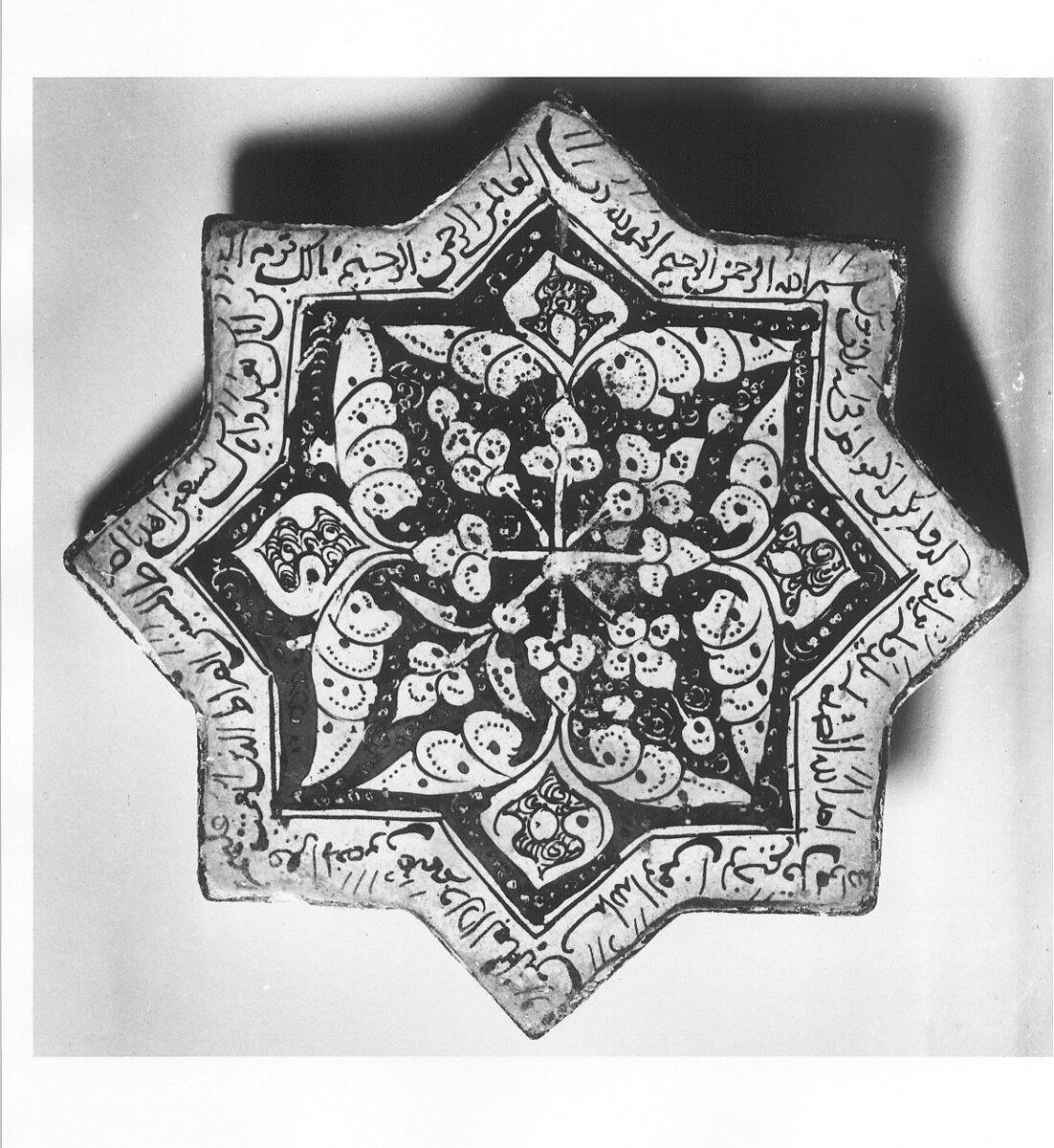 Star-Shaped Tile, Stonepaste; luster-painted with touches of cobalt on opaque white glaze under transparent glaze 