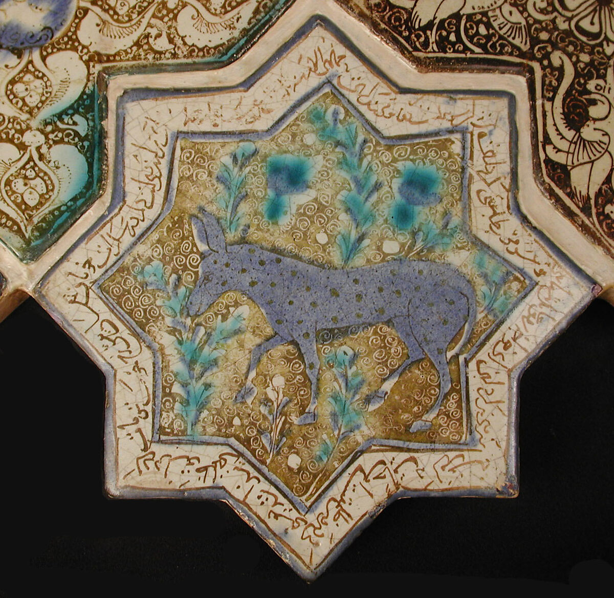Star-Shaped Tile, Stonepaste; inglaze painted in blue and turquoise and luster-painted on opaque white glaze 