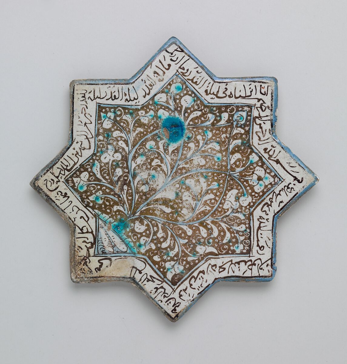 Eight-pointed Star Tile with Foliage and Inscription, Stonepaste; luster-painted on opaque white glaze under transparent glaze 
