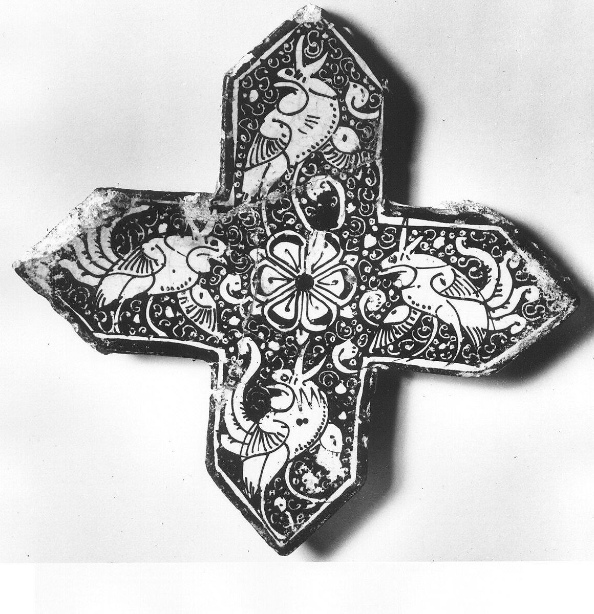 Cross-Shaped Tile, Stonepaste; inglaze painted in blue and turquoise and luster-painted on opaque white glaze