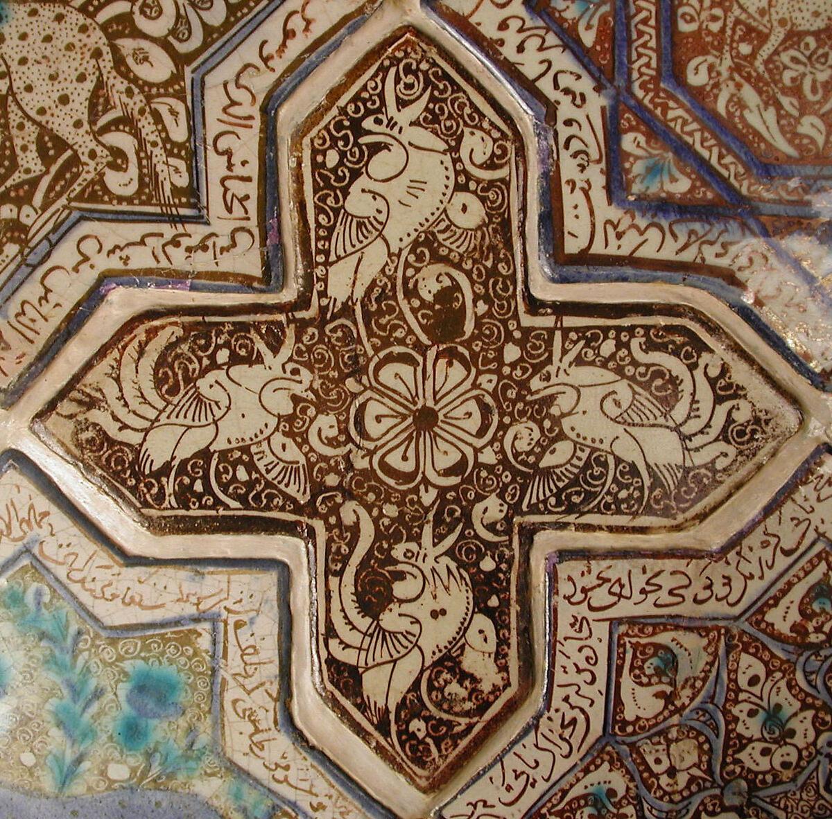 Cross-Shaped Tile, Stonepaste; inglaze painted in blue and turquoise and luster-painted on opaque white glaze