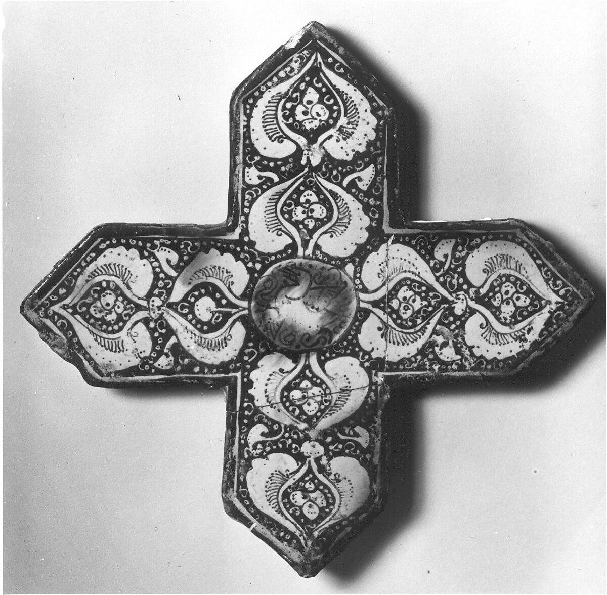 Cross-Shaped Tile, Stonepaste; inglaze painted in blue and turquoise and luster-painted on opaque white glaze