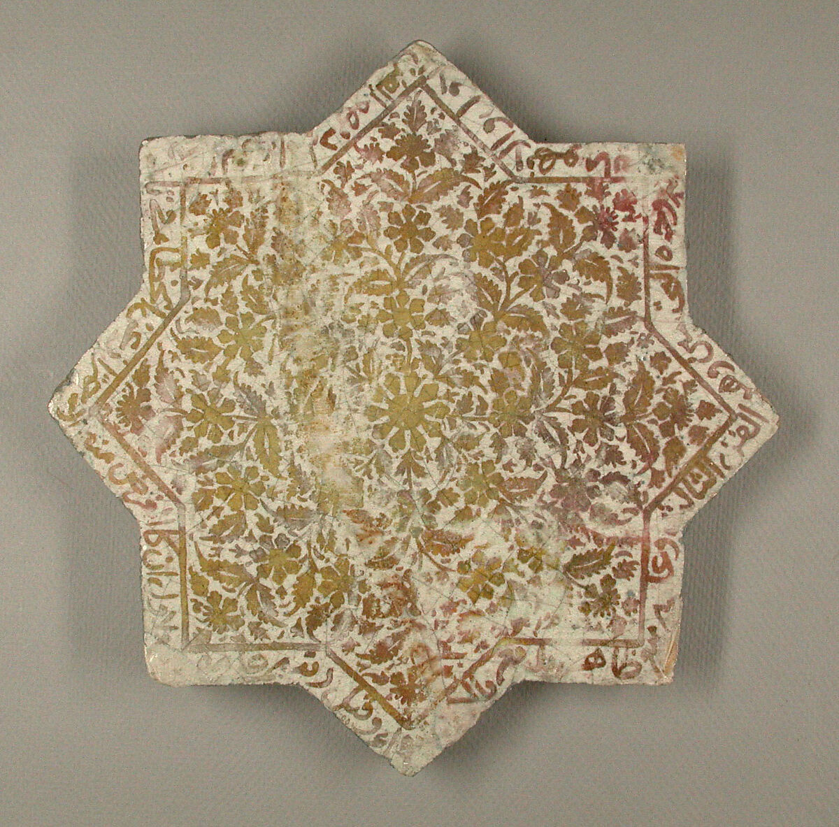 Star-Shaped Tile, Earthenware; luster-painted on opaque white glaze