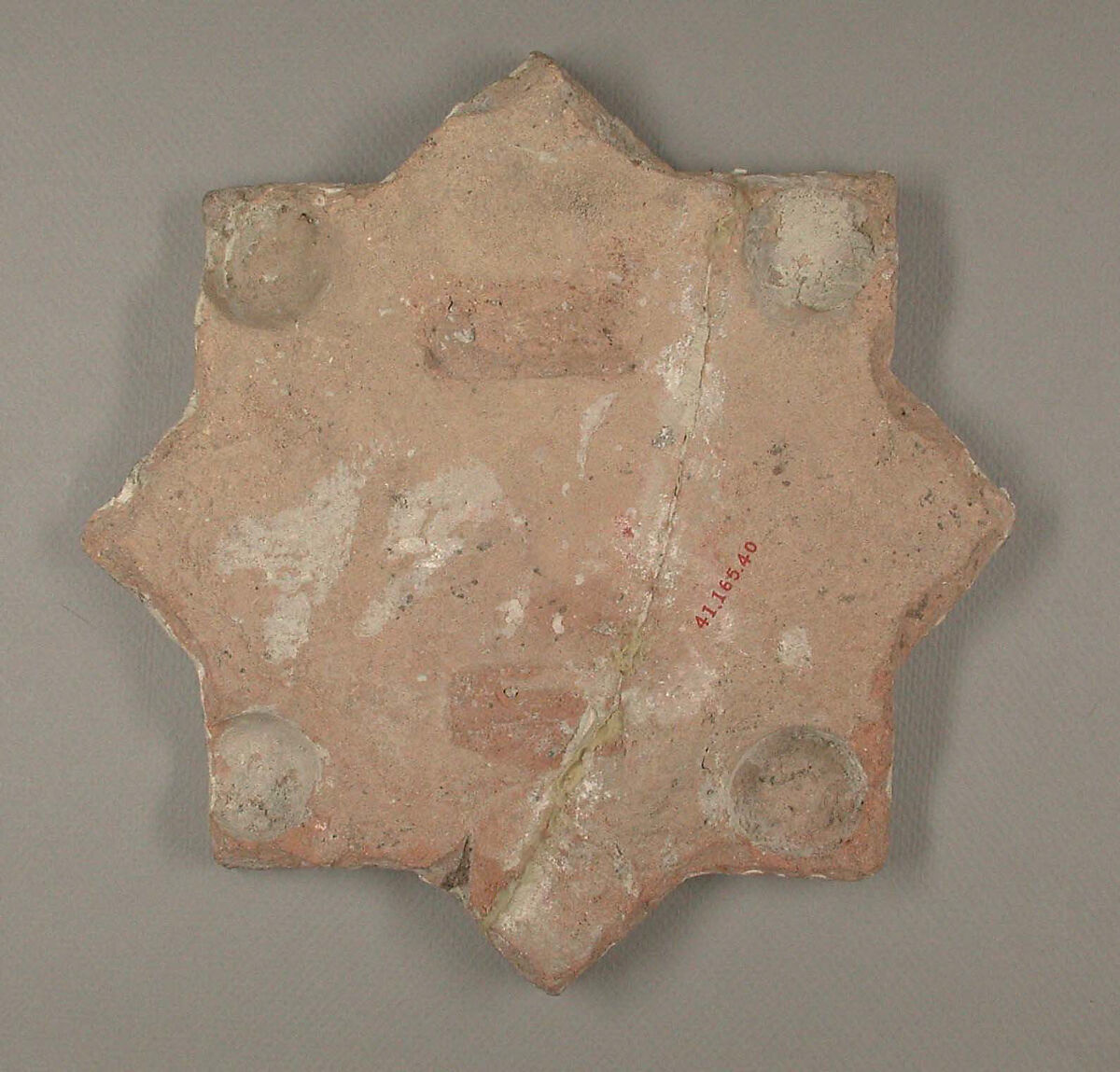 Star-Shaped Tile, Earthenware; luster-painted on opaque white glaze