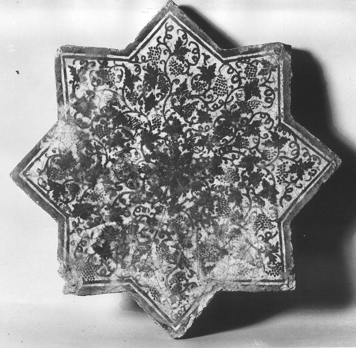 Star-Shaped Tile, Earthenware; luster-painted on opaque white glaze