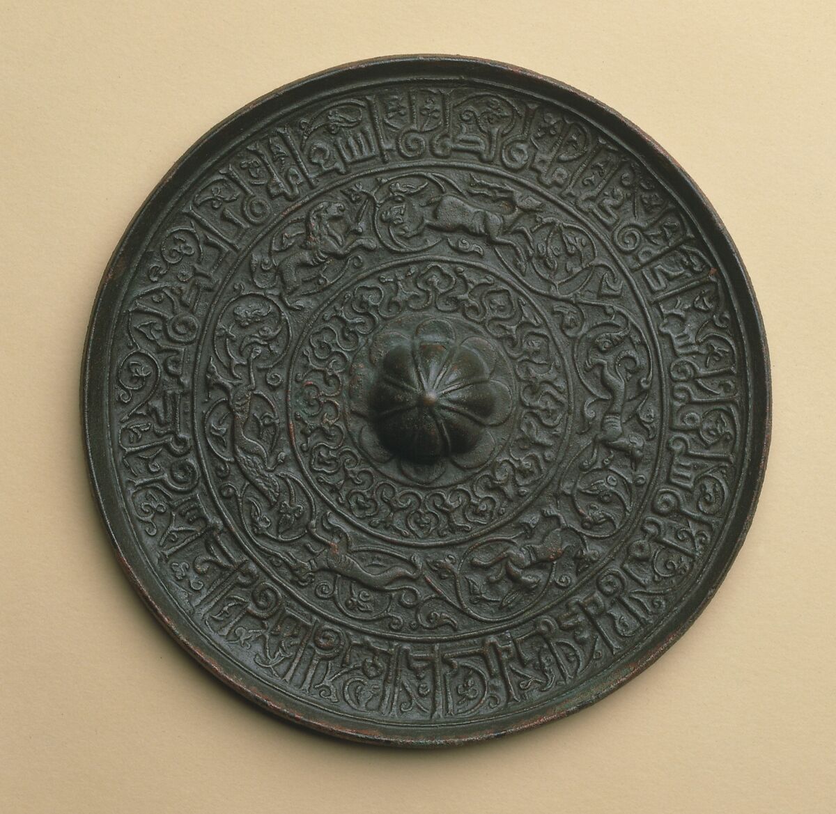 Mirror, Bronze; cast, chased