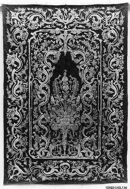 Hanging, Wool; design in wool applique outlined in silk, broken scrolls in silver thread couched in brickwork pattern; lining of brown satin.