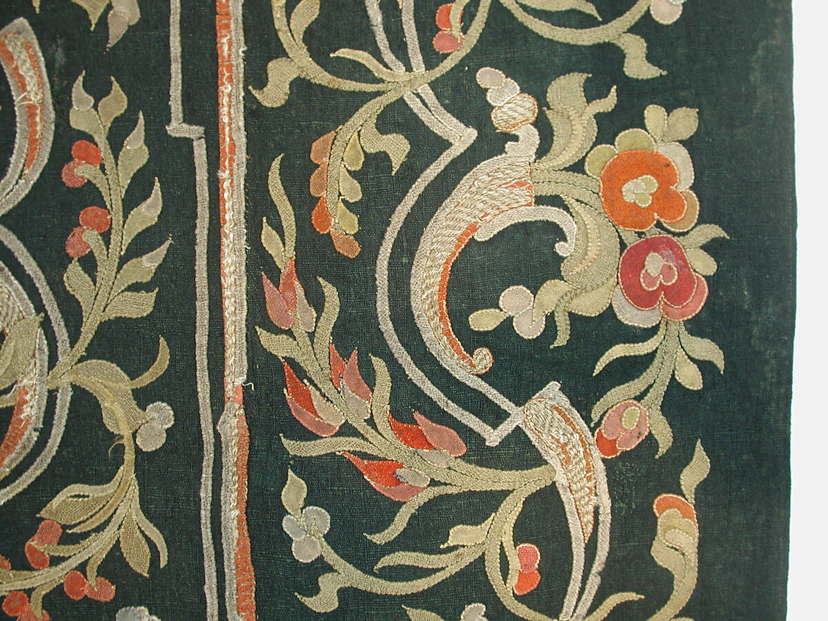 Hanging, Wool; design in wool applique outlined in silk, broken scrolls in silver thread couched in brickwork pattern; lining of brown satin.