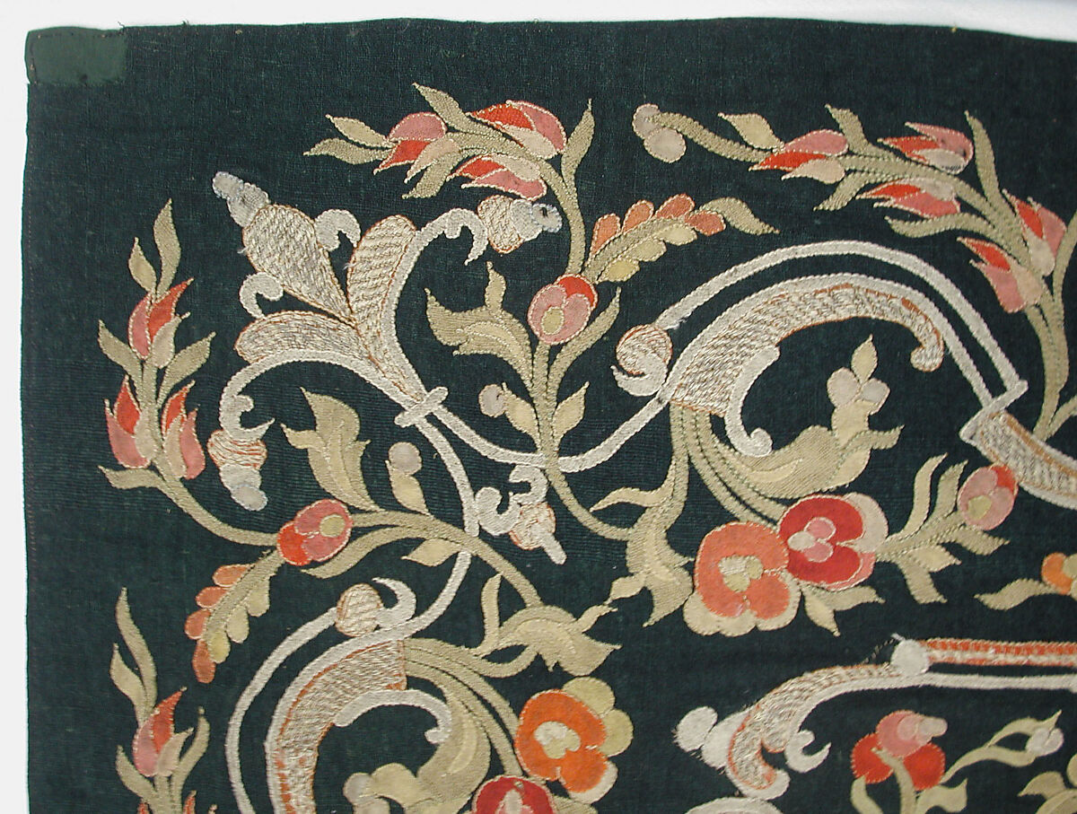 Hanging, Wool; design in wool applique outlined in silk, broken scrolls in silver thread couched in brickwork pattern; lining of brown satin.