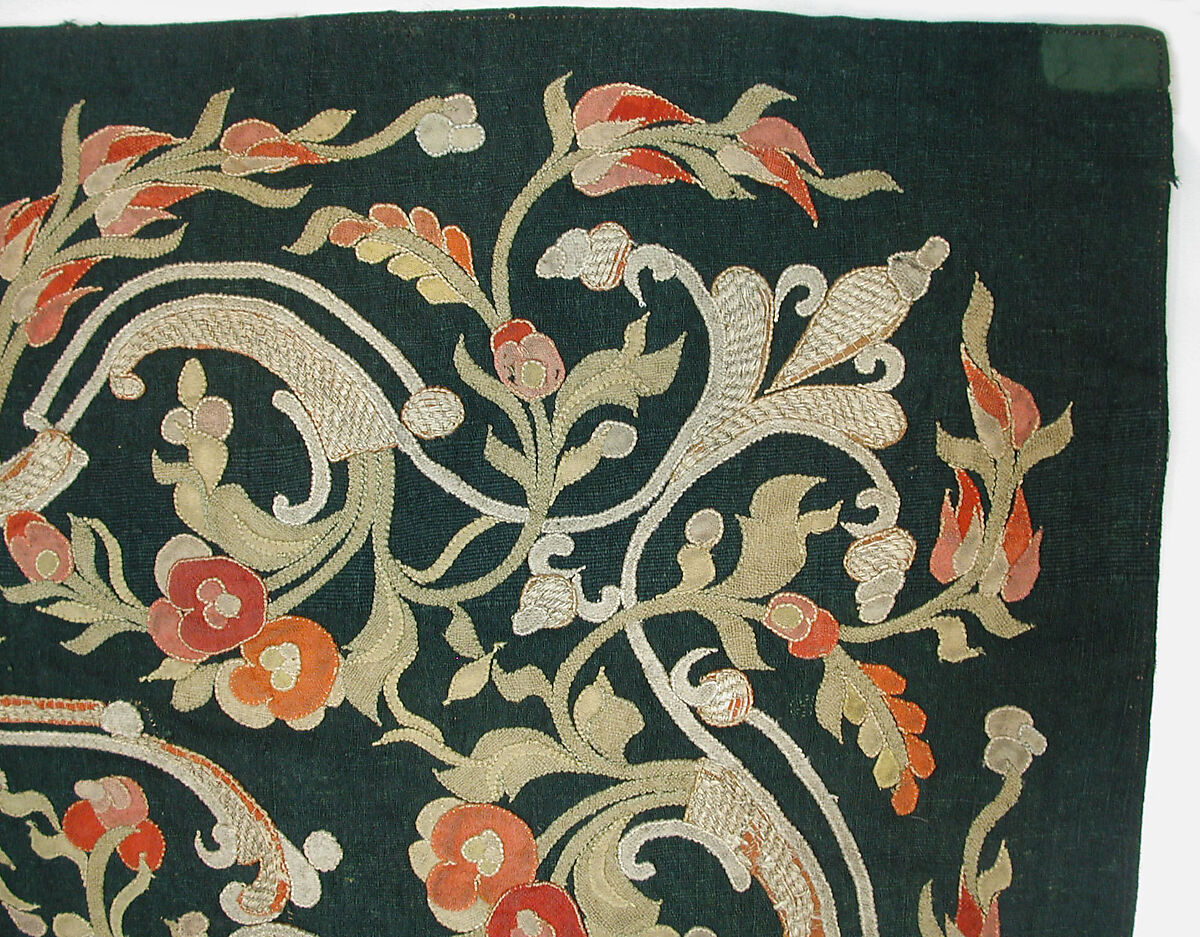 Hanging, Wool; design in wool applique outlined in silk, broken scrolls in silver thread couched in brickwork pattern; lining of brown satin.