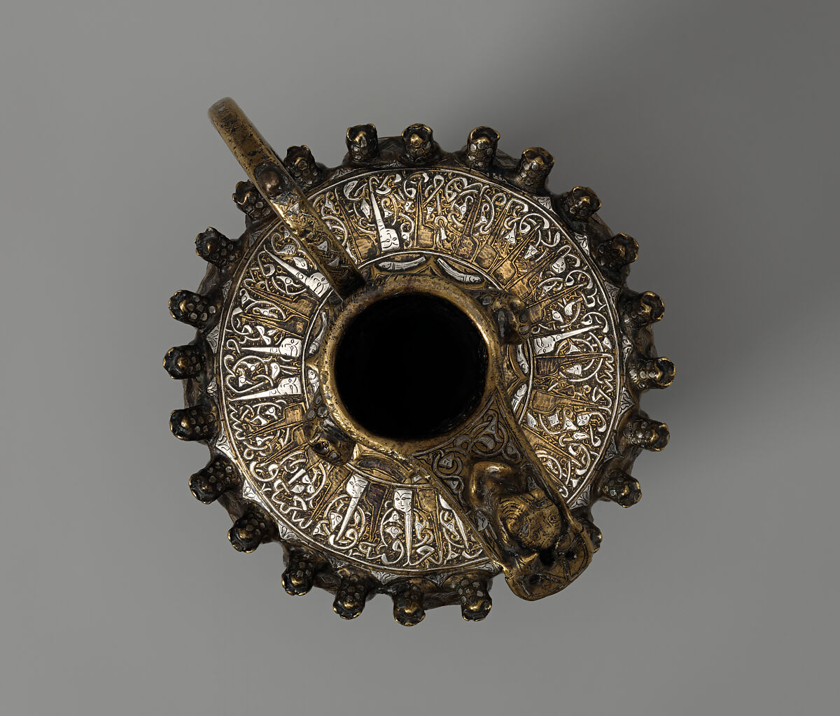 Ewer, Brass; raised, repoussé, inlaid with silver and a black compound