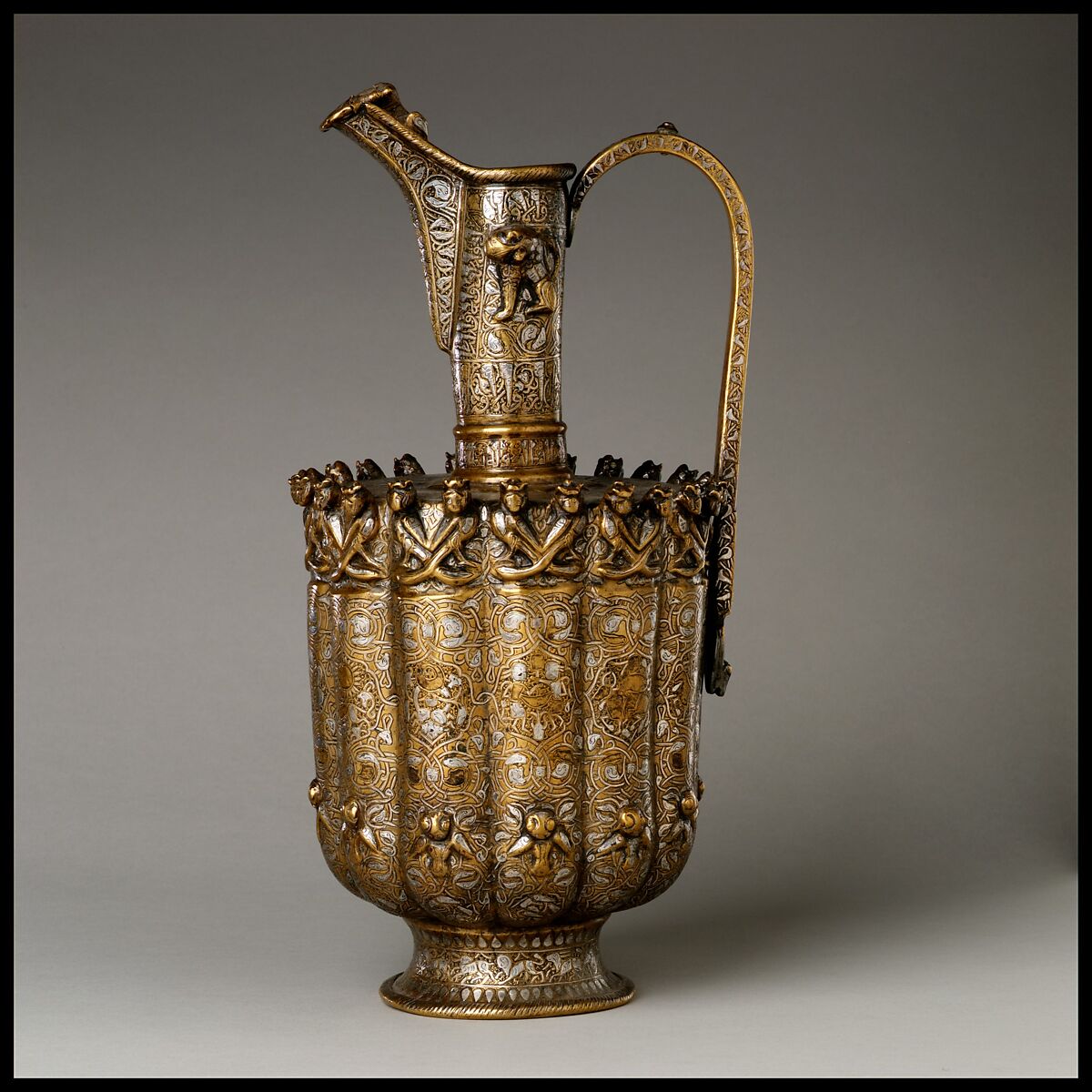 Ewer, Brass; raised, repoussé, inlaid with silver and a black compound