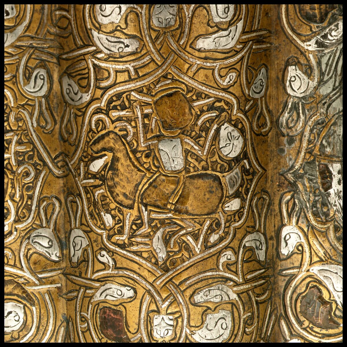 Ewer, Brass; raised, repoussé, inlaid with silver and a black compound