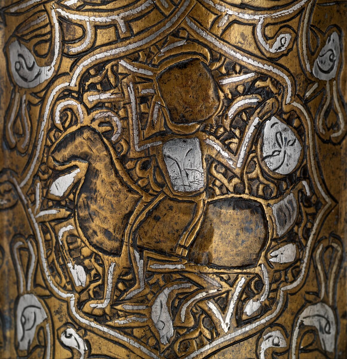 Ewer, Brass; raised, repoussé, inlaid with silver and a black compound