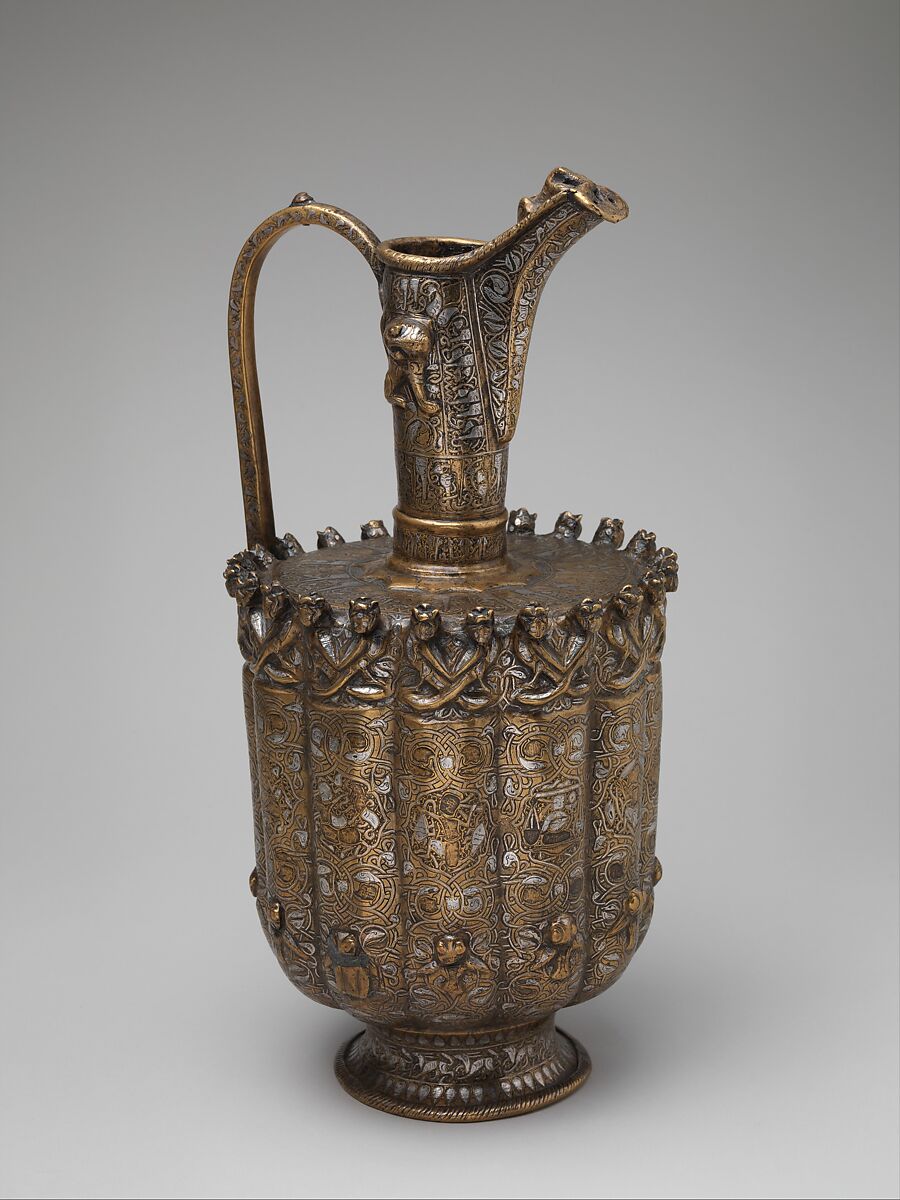 Ewer, Brass; raised, repoussé, inlaid with silver and a black compound 