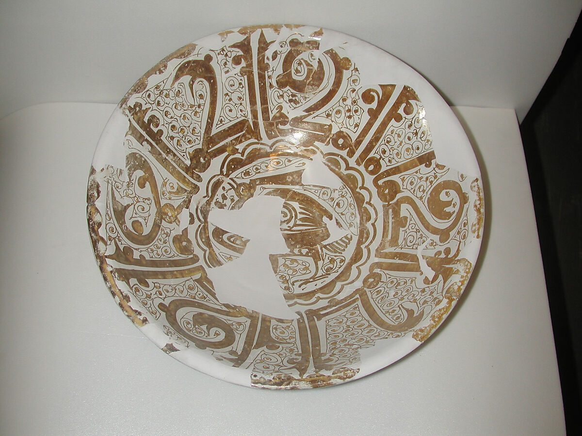 Bowl, Earthenware; luster-painted on opaque white glaze under transparent colorless glaze 