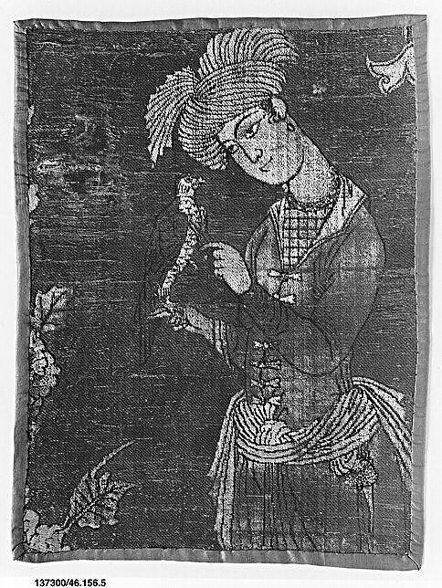 A Young Man Attending to a Falcon, Silk, metal wrapped thread, and continuous floats of flat metal thread; cut and voided velvet, bouclé