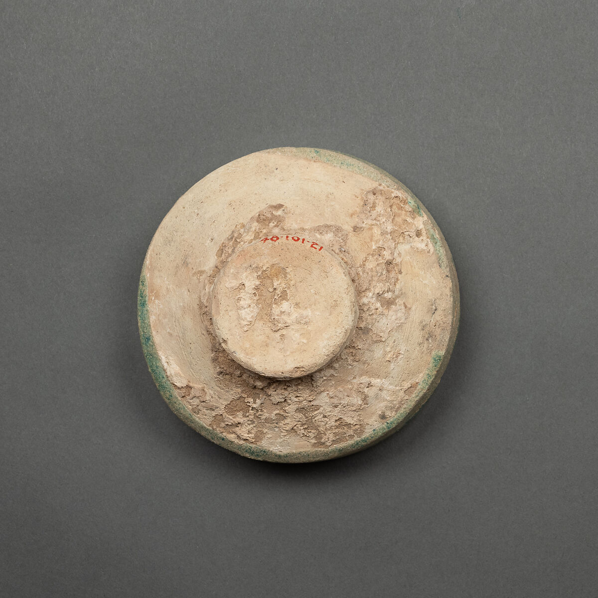Dish, Earthenware; buff body under blue glaze, probably alkaline