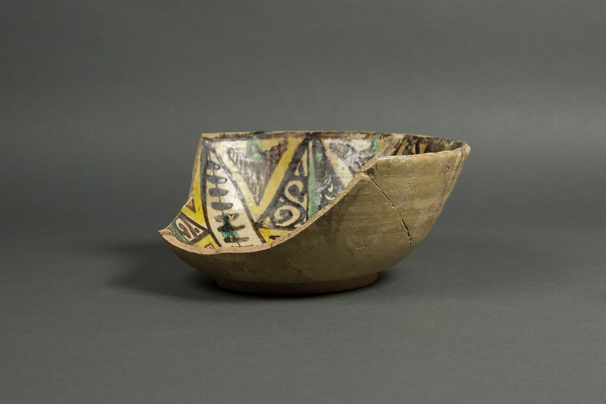 Bowl, Earthenware; decoration in black, green and yellow, glazed